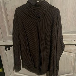 Husband never worn. Nice stripped long sleeve.